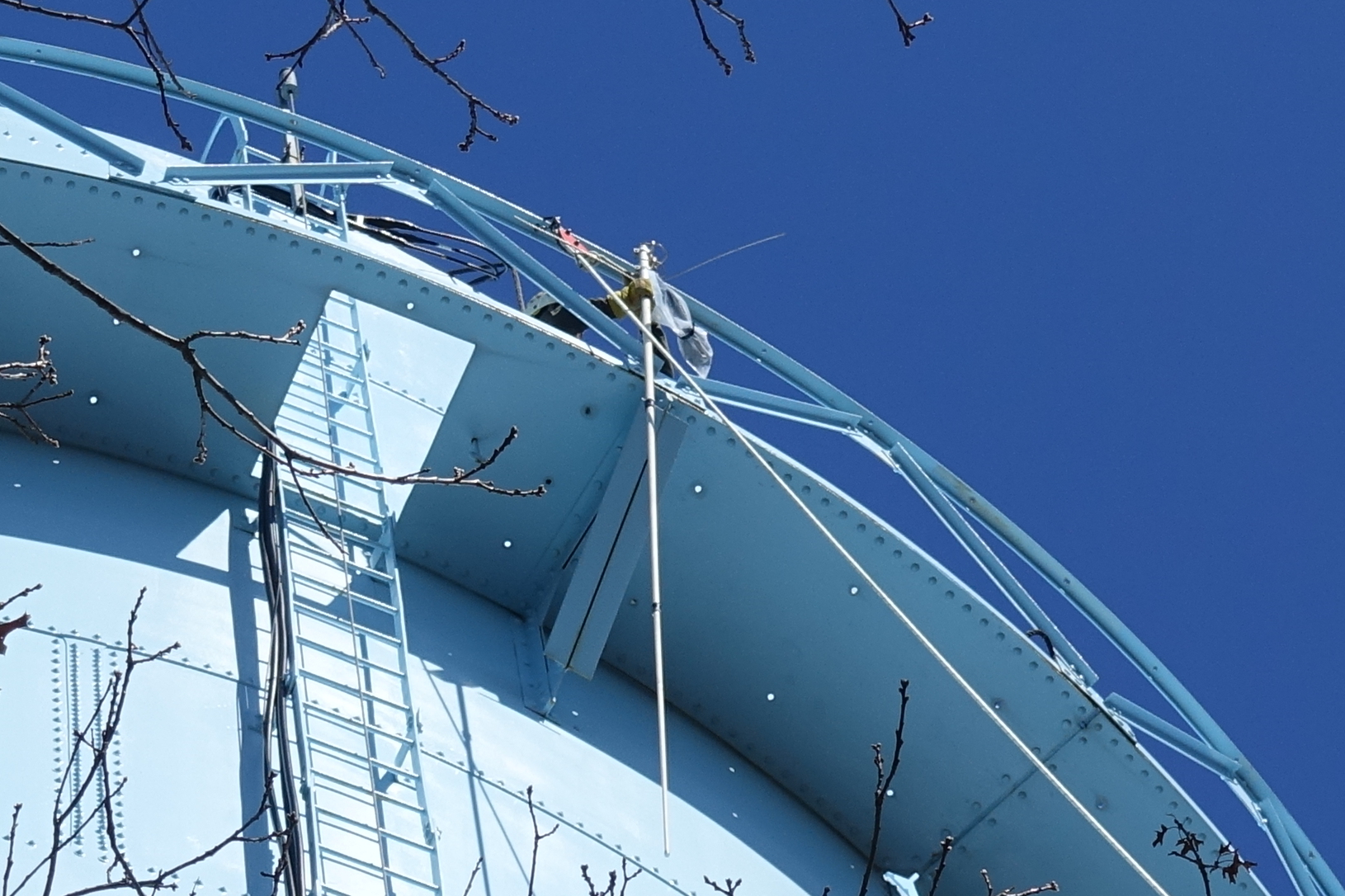 GP9 antenna on the catwalk with crew